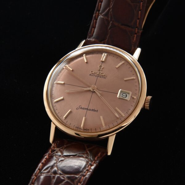 1960s Omega Seamaster 14k rose-gold watch with original restored dial, markers, hands, hesalite crystal, and 500 series automatic movement.