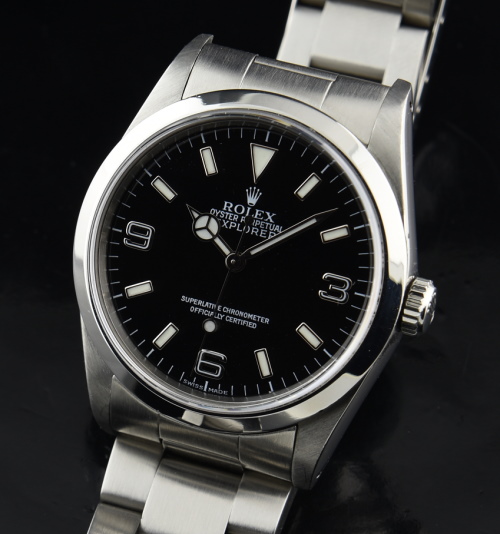 1991 Rolex 36mm Explorer stainless steel watch with original flip-lock bracelet, Oyster case, service box, and automatic winding movement.