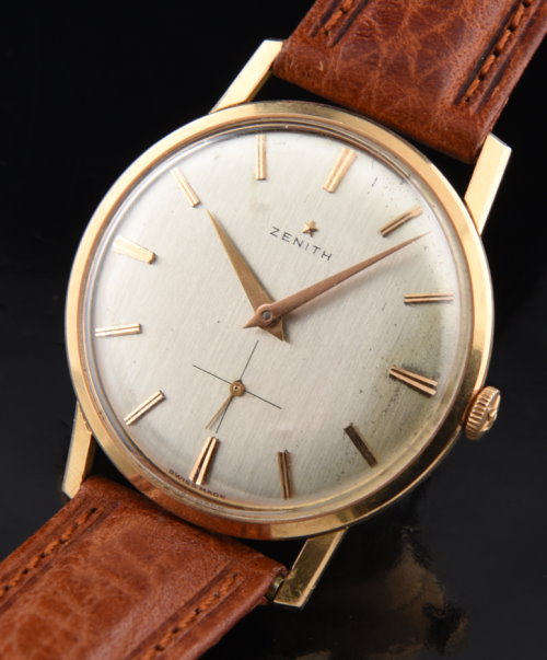 1960s Zenith 18k solid-gold watch with original dial, Dauphine hands, correct crown, case, and cleaned, accurate manual winding movement.