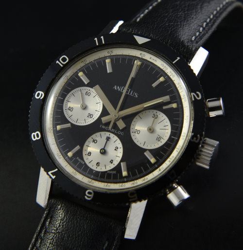 1960s Angelus stainless steel chronograph watch with original panda dial, case, turning bezel, and Valjoux 72 manual column wheel movement.