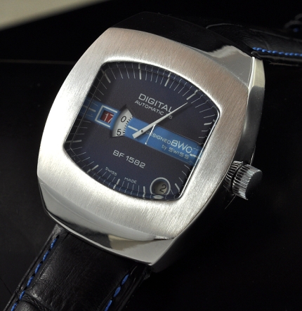 1970s BWO direct-read stainless steel digital watch with original blue dial, chunky case, offset date, sweep seconds, and cleaned movement.