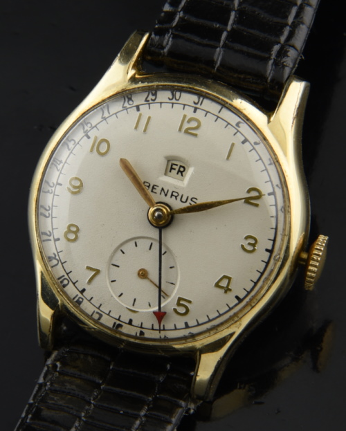 1950s Benrus 30mm Day Date Pointer rolled-gold watch with original case, restored dial, and cleaned caliber CE-13 manual winding movement.