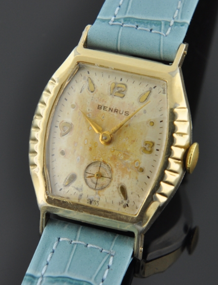 1950s Benrus gold-filled art-deco watch with original scalloped bezel, raised markers, hands, and finely crafted manual winding movement.