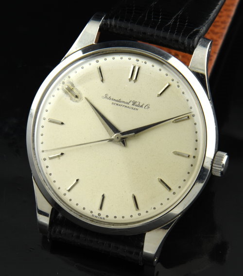 1950s IWC 35mm stainless steel watch with original narrow bezel, Dauphine hands, arrow markers, and fine caliber 89 manual winding movement.