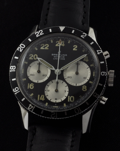1960s Breitling Geneve Unitime stainless steel co-pilot chronograph watch with original large case, 24-hour dial, and Venus 178 movement.