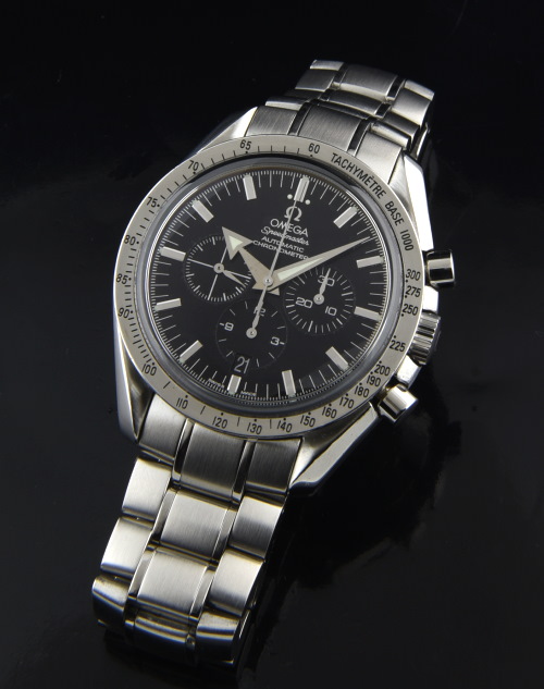 2002 Omega Speedmaster broad-arrow stainless steel chronograph watch with original date feature, and caliber 3303 column wheel movement.