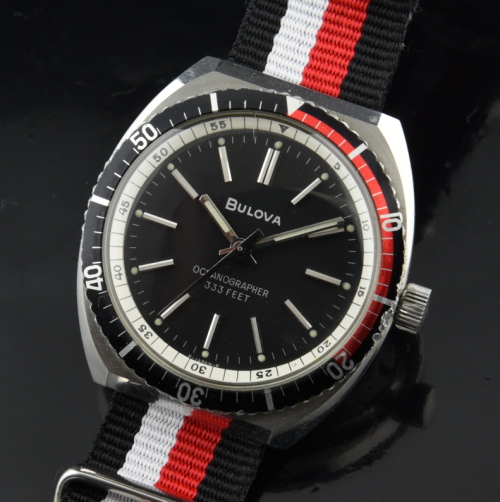 1970s Bulova 37.5mm Oceanographer stainless steel dive watch with original turning bezel, dial, hands, crown, and manual winding movement.