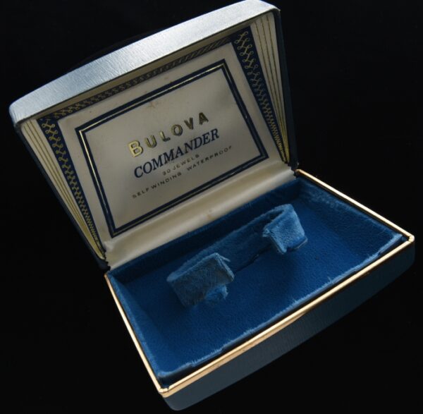 1960s Bulova Commander uncommon box measuring 3.5x4.5" with silk and blue velvet.