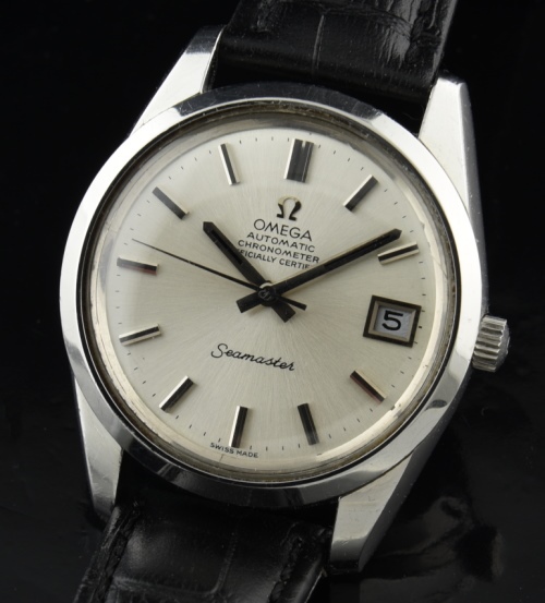 1973 Omega 35.5mm Seamaster stainless steel watch with original case, dial, hands, markers, and chronometer-grade caliber 1011 movement.