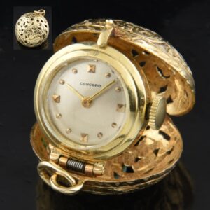 Concord 24.5mm 14k solid-gold ladied pendant watch with original dial, round cage, markers, and recently cleaned manual winding movement.