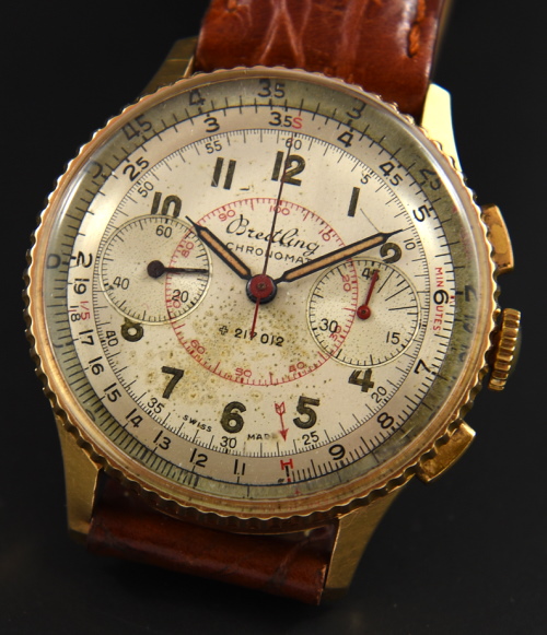 1950s Breitling 35.5mm Chronomat 18k solid-gold watch with original dial, turning bezel, pencil hands, and fine, cleaned Venus 175 movement.