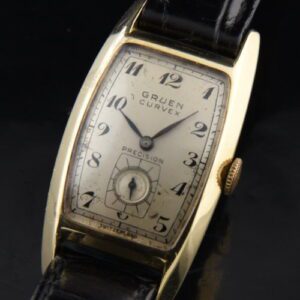 1943 Gruen Curvex 22x40mm 14k solid-gold watch with original curved case in excellent condition, and fine, cleaned manual winding movement.
