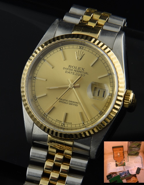 2000 Rolex Datejust two-toned 18k gold and steel watch with orginal box, papers, Jubilee bracelet, and cleaned automatic winding movement.