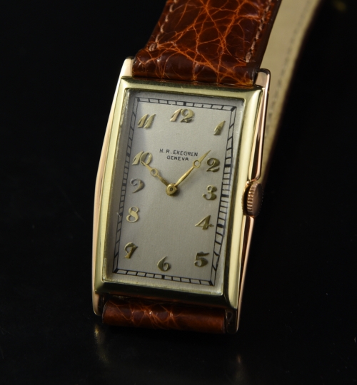 Ekegren 18k solid-yellow-and-rose-gold watch owned by Walter Stuempfig with original cleaned dial, Breguet numerals, and 19-jewel movement.