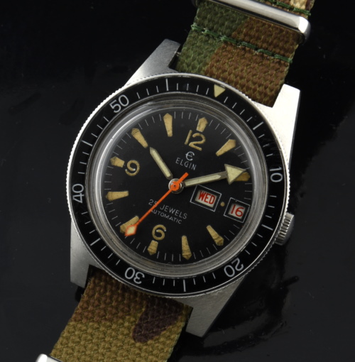 1970s Elgin 38mm stainless steel dive watch with original Explorer-style dial, handset, turning bezel, and clean automatic winding movement.