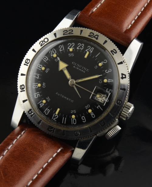 1960s Glycine Airman stainless steel military watch with original 24-hour black dial, case, hacking-seconds feature, and automatic movement.