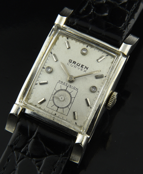 1950s Gruen Curvex 14k solid-white-gold watch with original restored dial, markers, hands, diamonds, and cleaned manual winding movement.