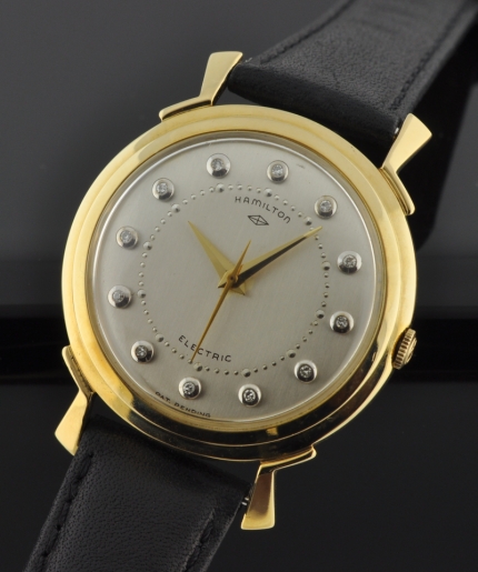 1957 Hamilton Electric Van Horn 14k yellow-gold watch with original diamond markers, silver dial, Dauphine hands, and accurate movement.