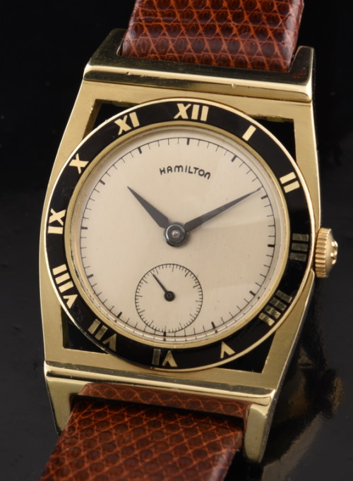 1948 Hamilton Piping Rock 14k solid-gold watch with original enamel bezel, restored dial, case, and caliber 747 manual winding movement.