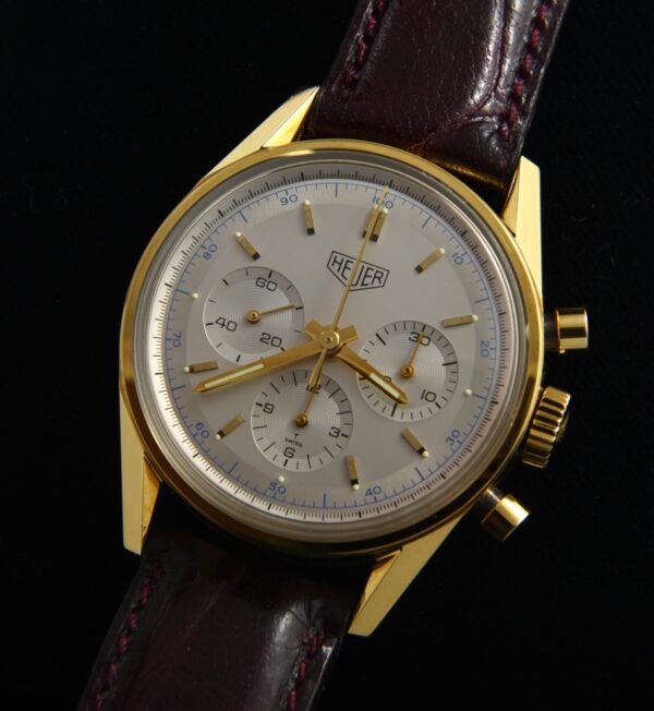 1990s Heuer Carrera 18k gold re-edition watch for the 1964 Classic Carrera with original box, papers, and Lemania 1873 manual movement.