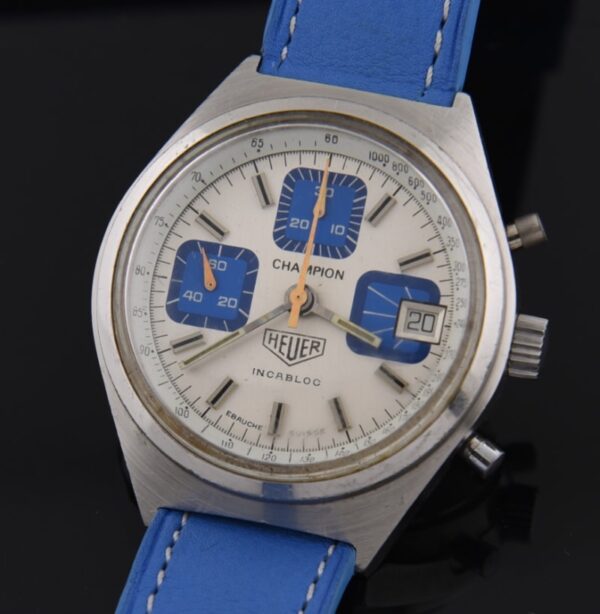 1970s Heuer 38mm Champion stainless steel chronograph watch with original dial, hands, case, and Valjoux 7765 automatic winding movement.