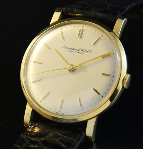 1950s IWC 33.25mm 18k solid-gold subtle watch with original pristine dial, case, and cleaned, accurate manual winding movement.