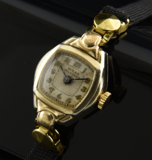 1940s Rolex 25mm Standard gold-filled ladies cocktail watch with original case, dial, raised Breguet numerals, and manual winding movement.