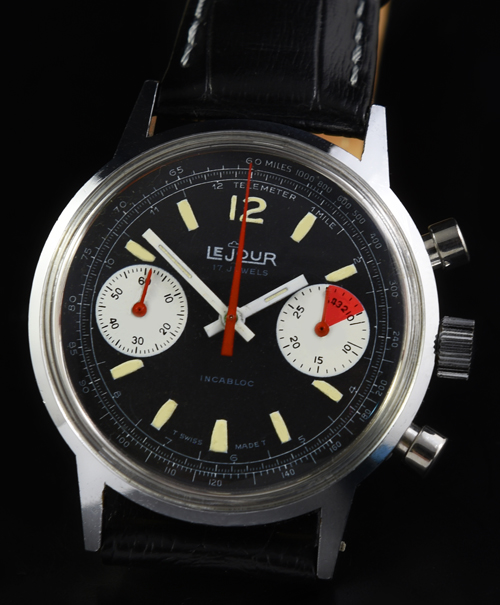 1960s LeJour stainless steel chronograph watch with original reverse-panda dial, screw-back case, and Valjoux 7733 manual winding movement.