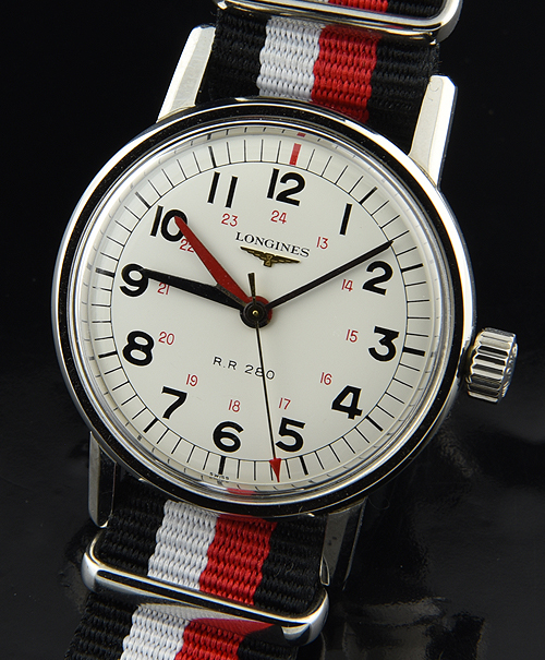 Longines Railroad stainless steel watch with original white dial, Arabic numerals, red 24-hour scale, and cleaned caliber 280 movement.