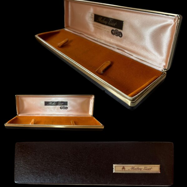 Uncommon 1970s vintage Mathey-Tissot watch box measuring 2.75x10" with a leatherette exterior, and brass logo.