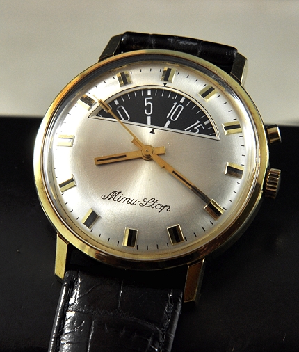 1960s Paul Garnier Minu-Stop gold-filled parking meter watch with original case, timer, silver dial, markers, hands, and manual movement.