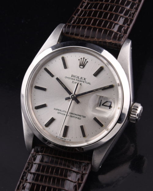 1972 Rolex Perpetual Date stainless steel watch with original case, dial, solid-white-gold baton markers, and automatic winding movement.