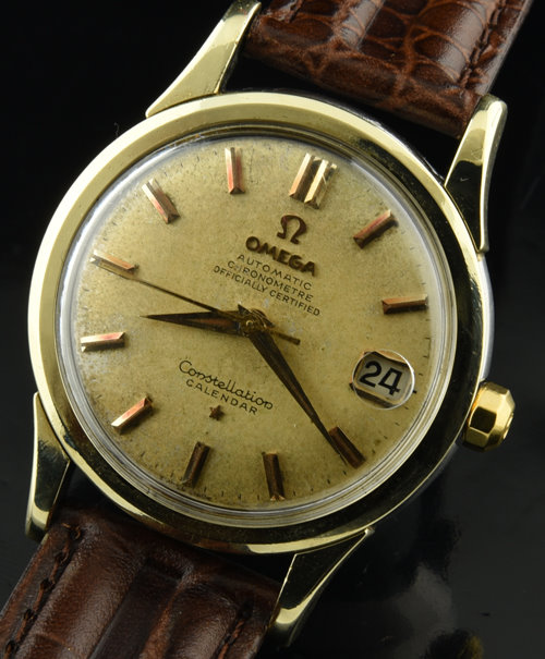 1959 Omega Constellation Calendar gold-capped watch with original case, lugs, winding crown, dial, and automatic chronometer-grade movement.