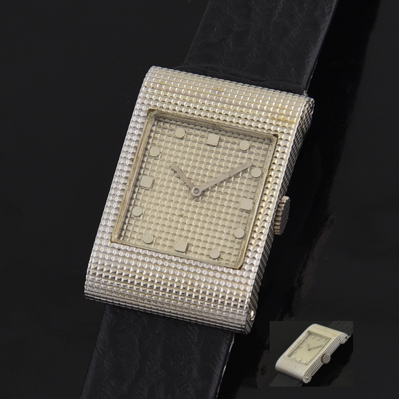 1958 Omega Boucheron Reflet 18k solid white gold watch with original dial, hands, knurled case, winding crown, and manual winding movement.