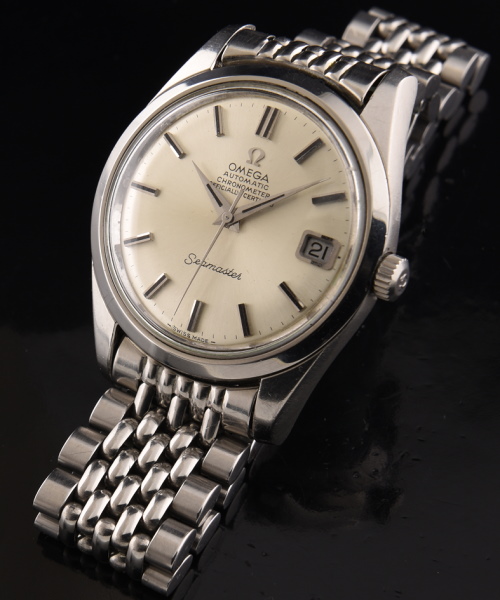 1970 Omega 35mm Seamaster stainless steel watch with original dial, Dauphine hands, crystal, winding crown, and chronometer-grade movement.