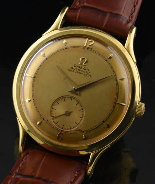 1950 Omega 35mm Centenary 18 solid-gold watch with original sterling-silver box, dial, case, and caliber 333 chronometer-grade movement.