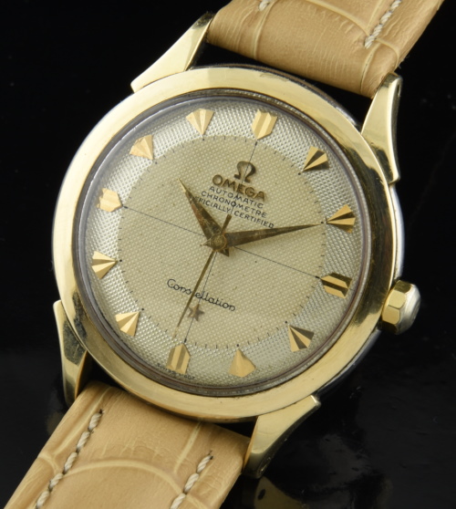 1954 Omega Constellation gold-capped watch with original two-toned dial, kite markers, case, and chronometer-grade caliber 354 movement.