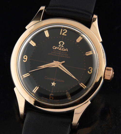 1957 Omega 35mm Constellation rose gold watch with original black glossy pie-pan dial, hands, and caliber 505 chronometer-grade movement.