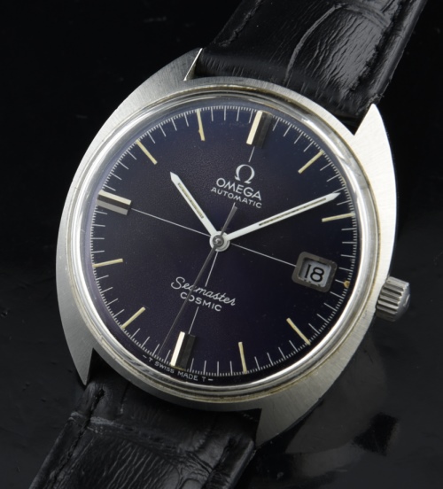 1970s Omega 35.5mm Seamaster Cosmic stainless steel watch with original blue dial, case, winding crown, and fine automatic winding movement.