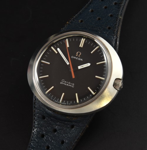 1970s Omega 41mm Dynamic stainless steel watch with original racing-style band, buckle, case, winding crown, and automatic winding movement.