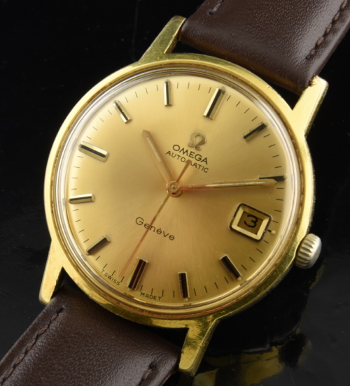1970 Omega 34.5mm Geneve gold-plated watch with original case, dial, handset, crown, and sparkling caliber 565 automatic winding movement.