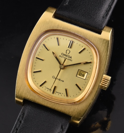 1973 Omega 33mm gold-plated ladies watch with original case, signed crystal, winding crown, dial, and cleaned automatic winding movement.