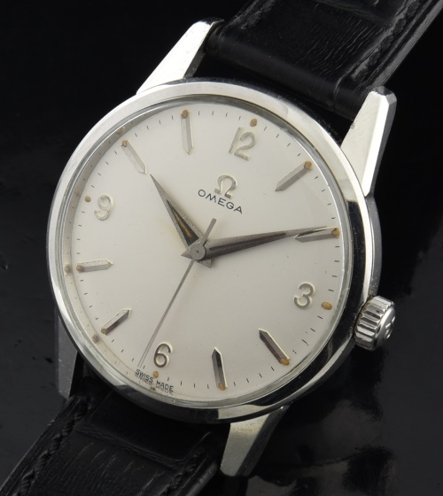1962 large Omega 35.5mm stainless steel watch with original Rolex Explorer configured dial, beveled lugs, and caliber 285 manual movement.