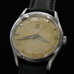 1951 vintage Omega manual winding watch with original dial, amazing patina, unique beveled markers on Dauphine hands, caliber 283 movement.