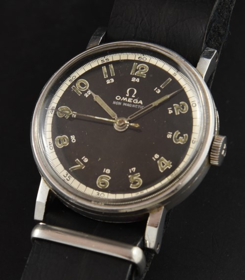 1939 Omega 32.5mm stainless steel WW2-era military watch with original black dial, lume, hands, and cleaned 30T2SC manual winding movement.