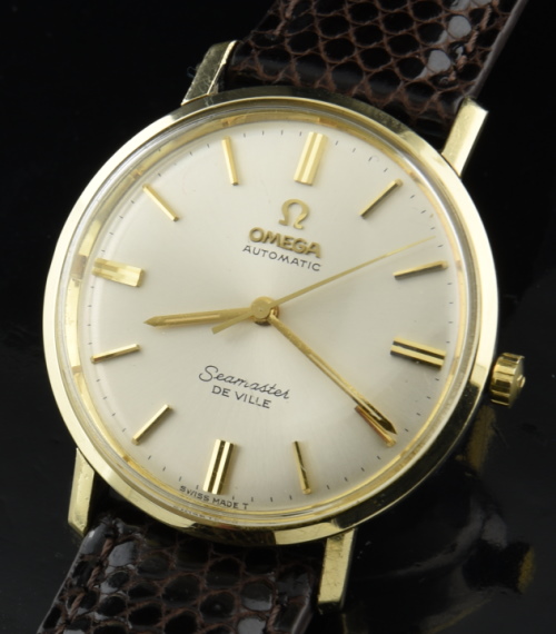 1960s Omega 34mm De Ville gold-capped watch with original steel back case, dial, hands, replaced crown, and fine clean 500-series movement.
