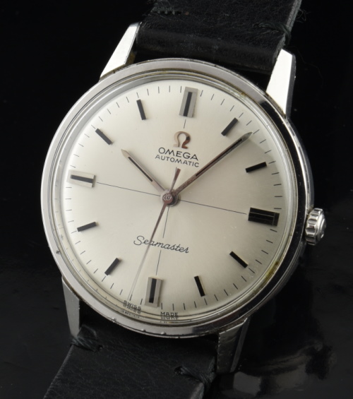 1966 Omega 34.5mm Seamaster stainless steel watch with original quadrant dial, needle hands, baton markers, and automatic winding movement.