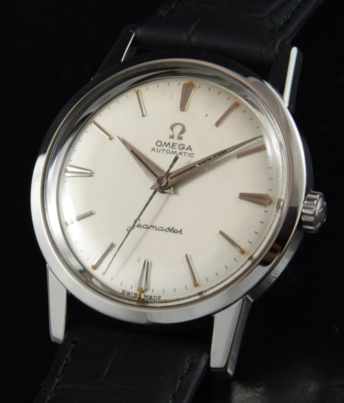 1961 Omega 33.5mm Seamaster stainless steel watch with original white dial, markers, Dauphine hands, case, and manual caliber 552 movement.
