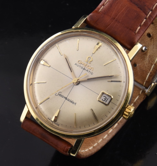 1960s Omega Seamaster gold-filled watch with original quadrant dial, markers, pencil hands, case, and cleaned automatic winding movement.
