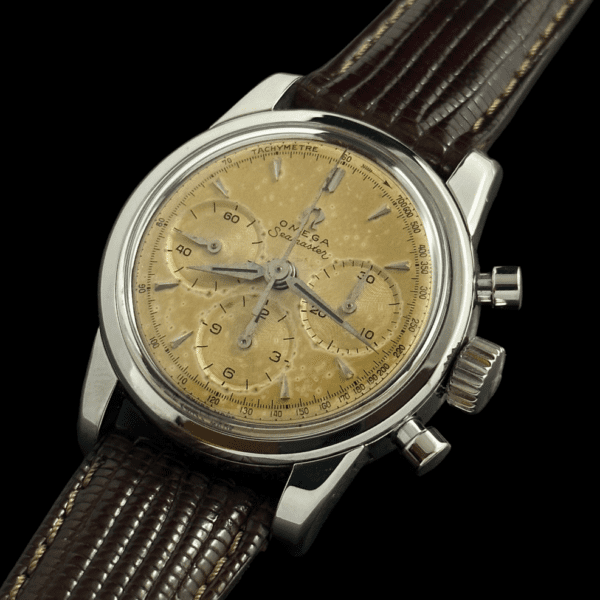 1958 Omega Seamaster stainless steel chronograph watch with original dial, polished case, mellow patina, and cleaned caliber 321 movement.